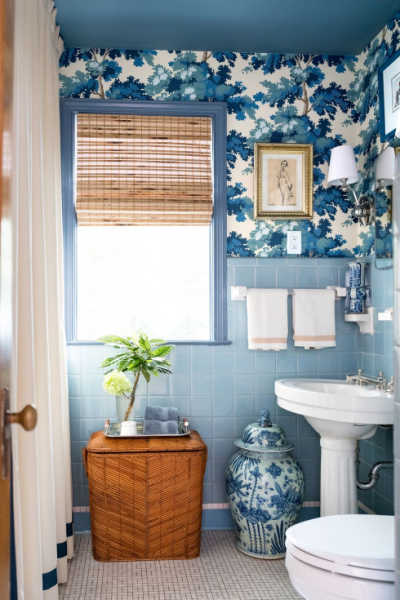 A tropical looking blue bathroom